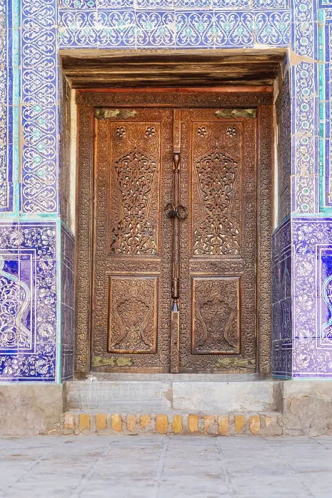 Framed Print : Khiva, Xorazm Region, Uzbekistan, Central Asia. Carved and decorated wooden door at the Khan Palace Framed Print : Khiva, Xorazm Region, Uzbekistan, Central Asia. Carved and decorated wooden door at the Khan Palace