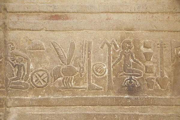Kom Obo Temple. Aswan, Egypt. Goddess Isis shown giving birth and breast feeding