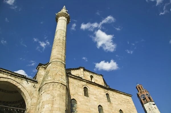 KOSOVO, Prishtina. Exterior of the Jashar Pasha Mosque and Turkish Quarter Clock Tower