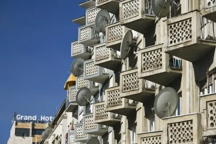 Framed Print : KOSOVO, Prishtina. Satellite dishes on apartment house