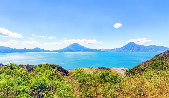 Framed Print : Lake Atitlan, Guatemala. Panorama view of Lake Atitlan, with Volcan Atitlan, Toliman and San Pedro on the shores with Volcan Fuego in the distance on the left Framed Print : Lake Atitlan, Guatemala. Panorama view of Lake Atitlan, with Volcan Atitlan, Toliman and San Pedro on the shores with Volcan Fuego in the distance on the left