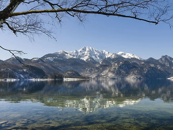Lake Kochelsee at village Kochel am See during winter in the Bavarian Alps. Mt