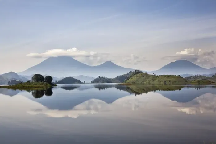 Framed Print : Lake Mutanda near Kisoro with the Virunga Vulcanoes as reflection in the lake Framed Print : Lake Mutanda near Kisoro with the Virunga Vulcanoes as reflection in the lake