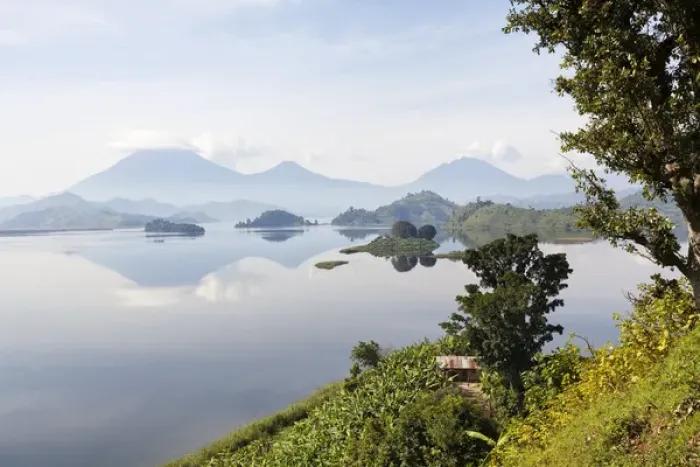 Framed Print : Lake Mutanda near Kisoro with the Virunga Vulcanoes as reflection in the lake Framed Print : Lake Mutanda near Kisoro with the Virunga Vulcanoes as reflection in the lake
