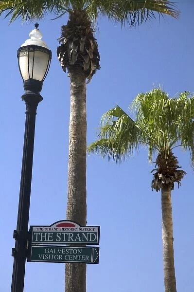 Lamp post and street sign in the Strand District of downtown Galveston, Texas