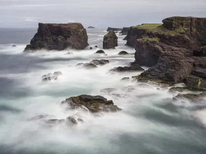 Framed Print : Landscape on the Eshaness peninsula. The famous cliffs and sea stacks of Eshness
