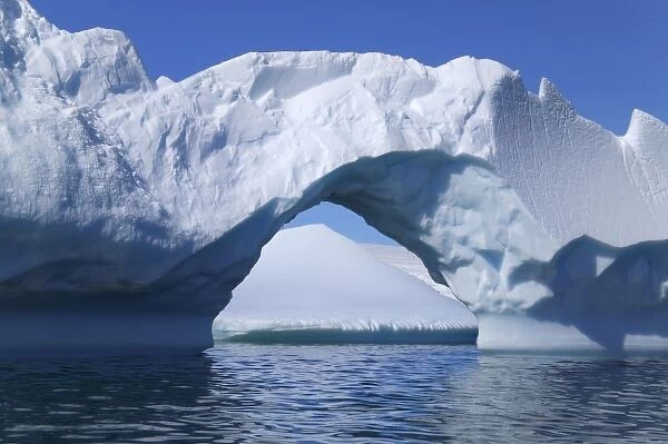 Landscape of naturally formed iceberg arch, American Palmer Station, Antarctica