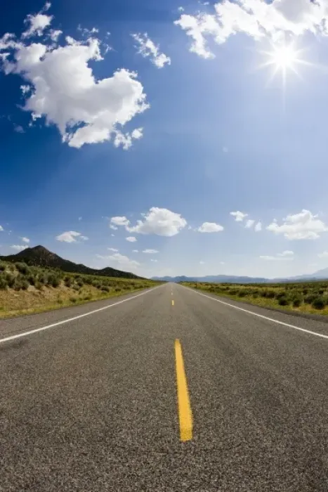 Framed Print : A two lane road extending into the distance of southwest Utah leading to the mountainous Framed Print : A two lane road extending into the distance of southwest Utah leading to the mountainous