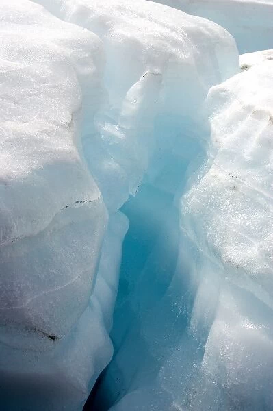 A large crevice in the arctic aufeis revealing laminations of ice and the unique