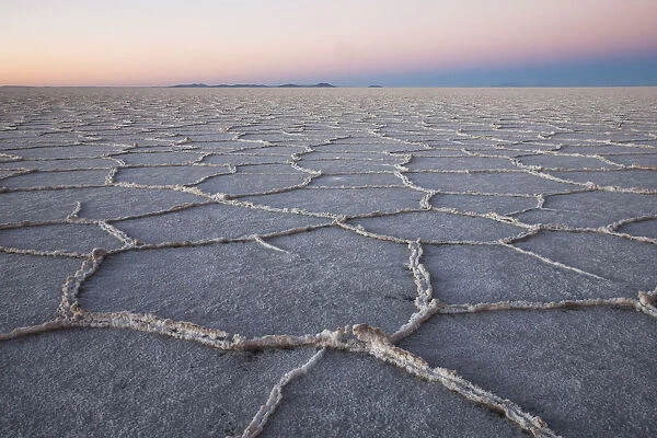 The largest salt flats in the world located in Uyuni, bolivia as the sun is rising