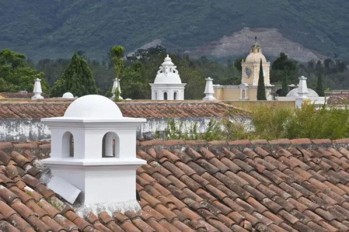 Framed Print : Latin America, Guatemala, Antigua, Tile Roofs with Chimneys