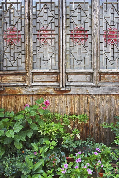 Latticed windows of an old house on Ziyang street in the old town, Linhai