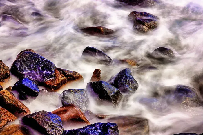 Framed Print : Lava beach rocks worn by centuries of sea water cover the black sand beaches of Bali Framed Print : Lava beach rocks worn by centuries of sea water cover the black sand beaches of Bali
