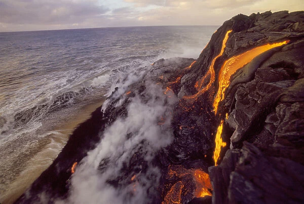 Lava flowing to meet the sea, Big Island, Hawaii