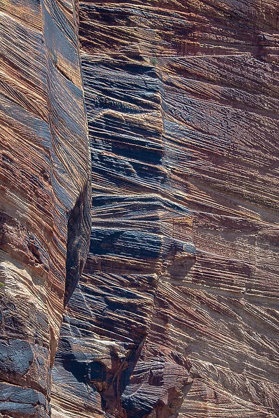 Layers of sedimentary rock edge the main highway that bisects Zion National Park