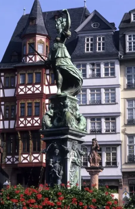 Framed Print : Life in Germany in Frankfurt the famous Romerberg Square statue of justice in old Framed Print : Life in Germany in Frankfurt the famous Romerberg Square statue of justice in old