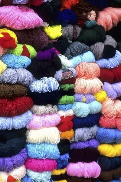 Life in Peru Cuzco beautiful color graphic of wool and fabric yarn in town with high