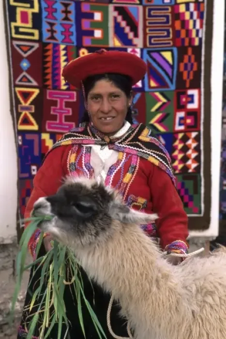 Framed Print : Life in Peru Cuzco in the mountains with native woman and her llama and color rug (MR) Framed Print : Life in Peru Cuzco in the mountains with native woman and her llama and color rug (MR)