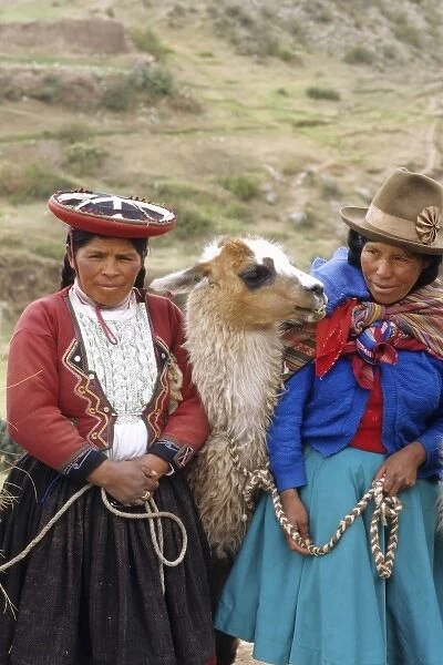 Life in Peru Cuzco in the mountains with native women and their llamas high elevation