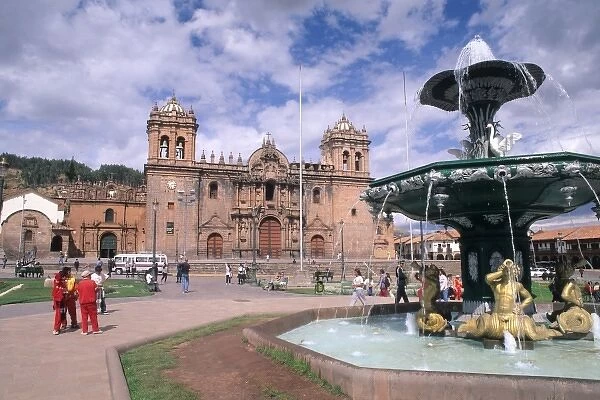 Life in Peru Cuzco in the mountains statues & fountain in Town Square and Cathedral