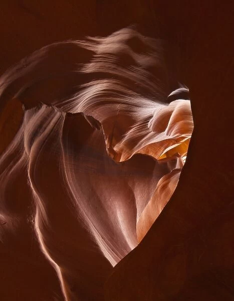 Light beams down into Upper Antelope Canyon forming a heart shape on the Navajo Reservation