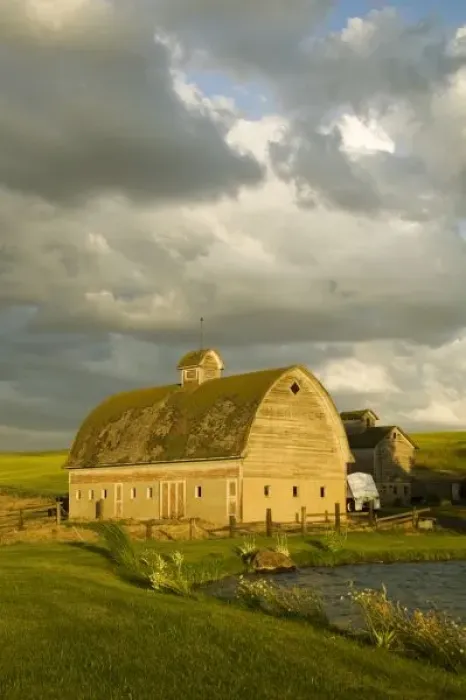 Framed Print : Last Light on Old Barn and Pond with Wild Clouds