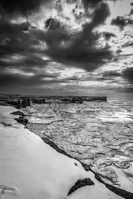 Framed Print : A light snowfall and contrasting darker terrain define the rugged landscape of Canyonlands National Park Framed Print : A light snowfall and contrasting darker terrain define the rugged landscape of Canyonlands National Park
