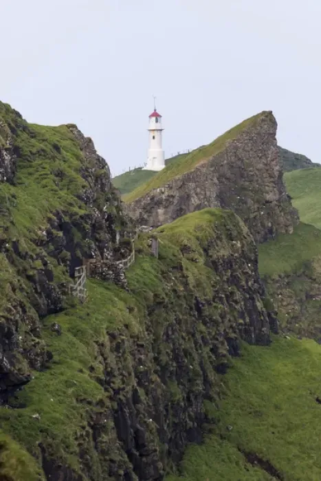 Framed Print : The lighthouse on Mykinesholmur. The island Mykines, part of the Faroe Islands in Framed Print : The lighthouse on Mykinesholmur. The island Mykines, part of the Faroe Islands in