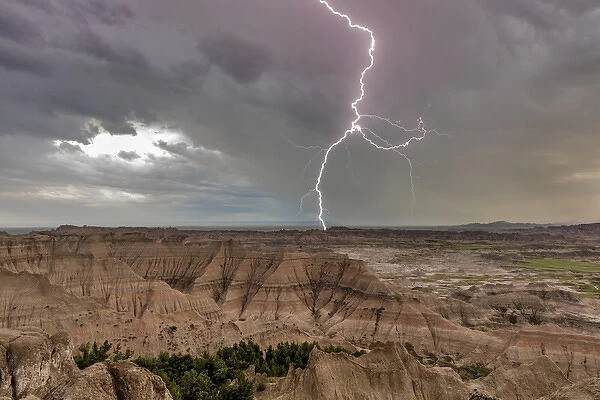 Lightning strike during thunderstorm from the Pinnacles Overlook in Badlands National Park