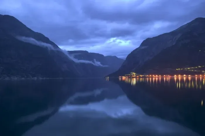 Framed Print : The lights of Eidfjord glisten beneath the damatic indego skies of a Nordic night Framed Print : The lights of Eidfjord glisten beneath the damatic indego skies of a Nordic night