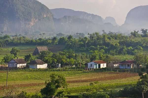 Limestone hill, farming land and village house, Vinales Valley, UNESCO World Heritage site