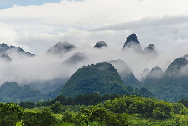 Limestone hills in mist, Xingping, Yangshuo, Guangxi, China