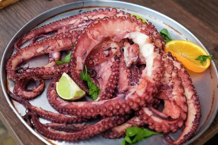 Framed Print : Lisbon, Portugal. Traditional grilled octopus