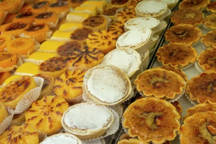 Framed Print : Lisbon, Portugal. Traditional Portuguese pastries. Nata's are the national dessert Framed Print : Lisbon, Portugal. Traditional Portuguese pastries. Nata's are the national dessert