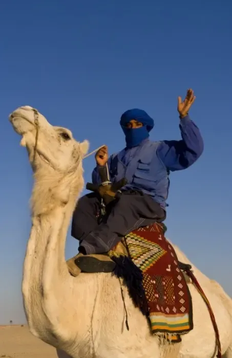 Framed Print : Local Bedouin man on camel ride in Douz in Sahara Desert in Tunisia Africa Framed Print : Local Bedouin man on camel ride in Douz in Sahara Desert in Tunisia Africa
