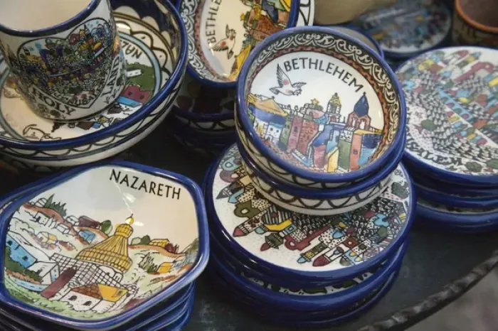 Framed Print : Local ceramic ware with Biblical themes on Nazareth, Israel sidewalk Framed Print : Local ceramic ware with Biblical themes on Nazareth, Israel sidewalk