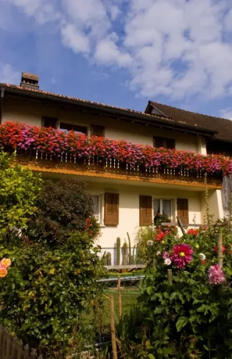 Framed Print : Local home with flowers in Balzers in small remote country of Leichtenstein Framed Print : Local home with flowers in Balzers in small remote country of Leichtenstein