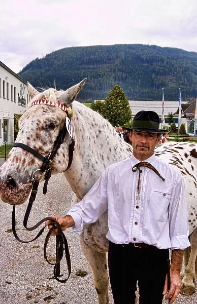 Local man with horse for show at horse show event in Tamsweg Austria alpine village