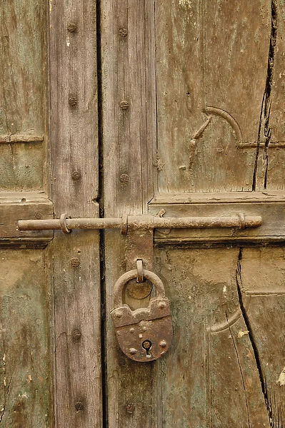 Locked door in a small gully (alley) in Delhi, India