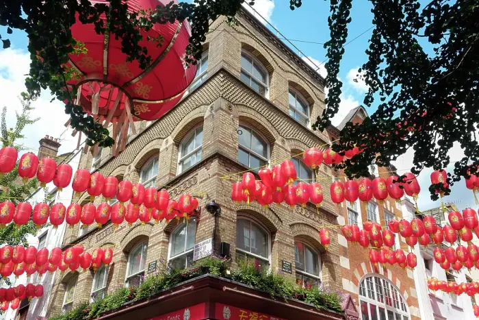 Framed Print : London, England, Great Britain. Chinatown district where red lanterns are found everywhere, old phone booths and souvenirs are found everywhere. (Editorial Use Only) Framed Print : London, England, Great Britain. Chinatown district where red lanterns are found everywhere, old phone booths and souvenirs are found everywhere. (Editorial Use Only)