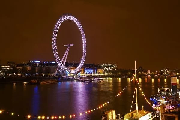 London Eye, River Thames and lights from restaurant ship RS Hispaniola, London, England
