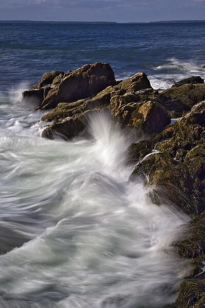 Long exposure of wave crashing against rocky coastline, Acadia National Park, Maine