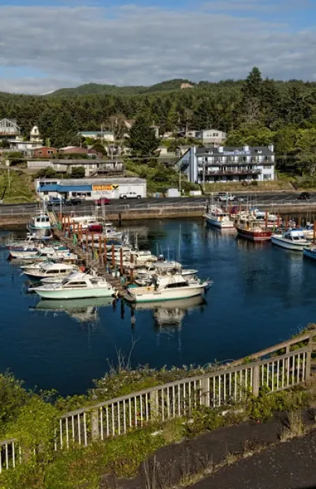 Framed Print : Looking down from above at Depoe Bay Oregon harbor with scenic colorful boats in pier Framed Print : Looking down from above at Depoe Bay Oregon harbor with scenic colorful boats in pier