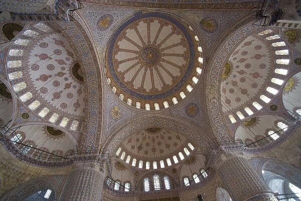 Looking up into the dome of the Blue Mosque with all of its blue tile work, Istanbul