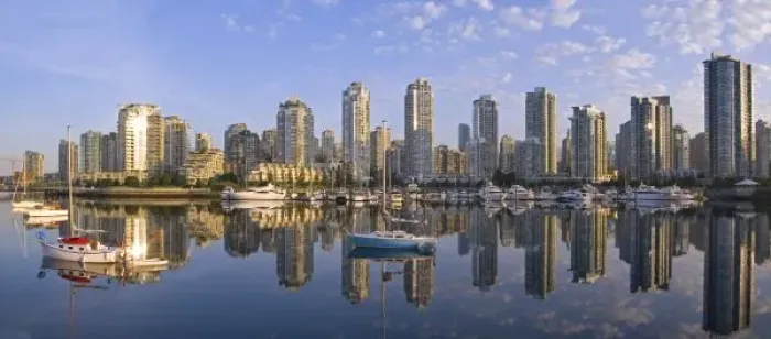 Framed Print : Looking across False Creek at the skyline of Vancouver British Columbia at sunrise