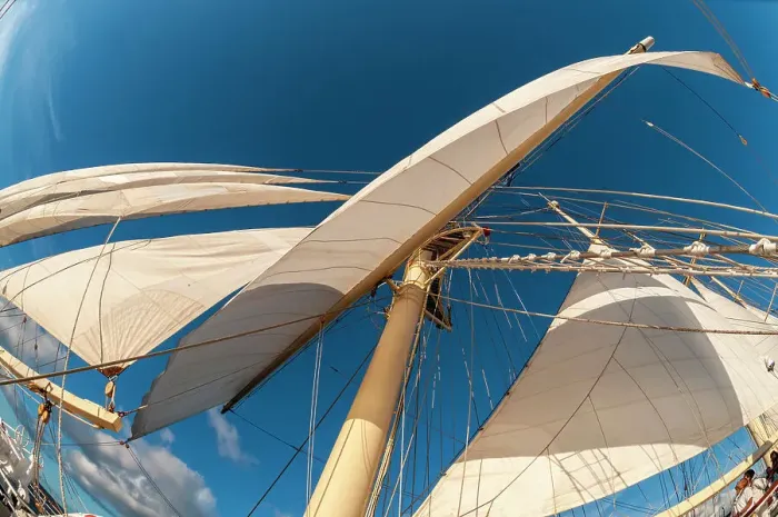 Framed Print : Looking up the at a mast and sails of a barquentine cruise ship. Deshaies, Basse Terre Island, Iles des Saintes, Guadeloupe, West Indies