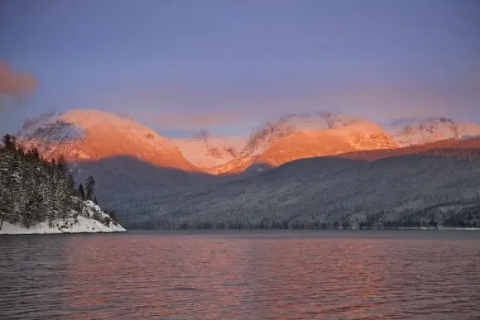 Framed Print : Looking toward Rocky Point the peaks catch alpenglow and reflect into Lake McDonald