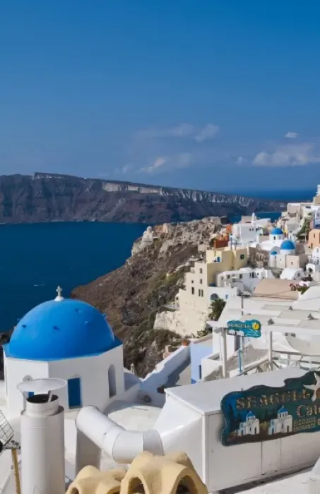 Framed Print : Looking down the steep cliffs of white buildings in beautiful Oia in Santorini in Framed Print : Looking down the steep cliffs of white buildings in beautiful Oia in Santorini in