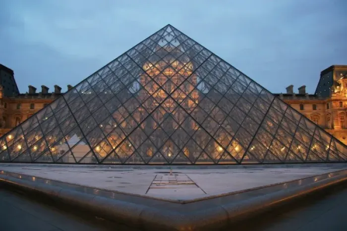 Framed Print : Louvre Museum. Facade of the building and glass pyramid designed by the architect Leo Ming Pei