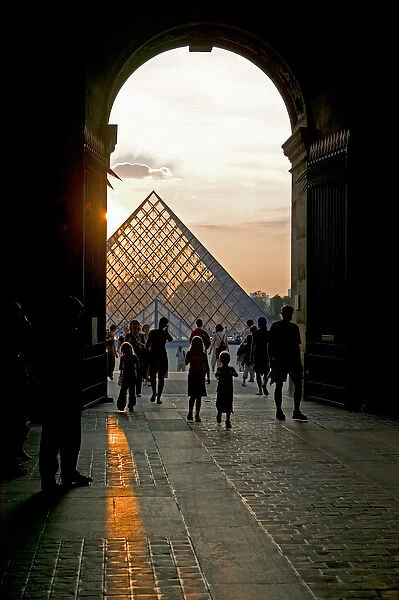 Louvre Pyramid, Paris, France sunset